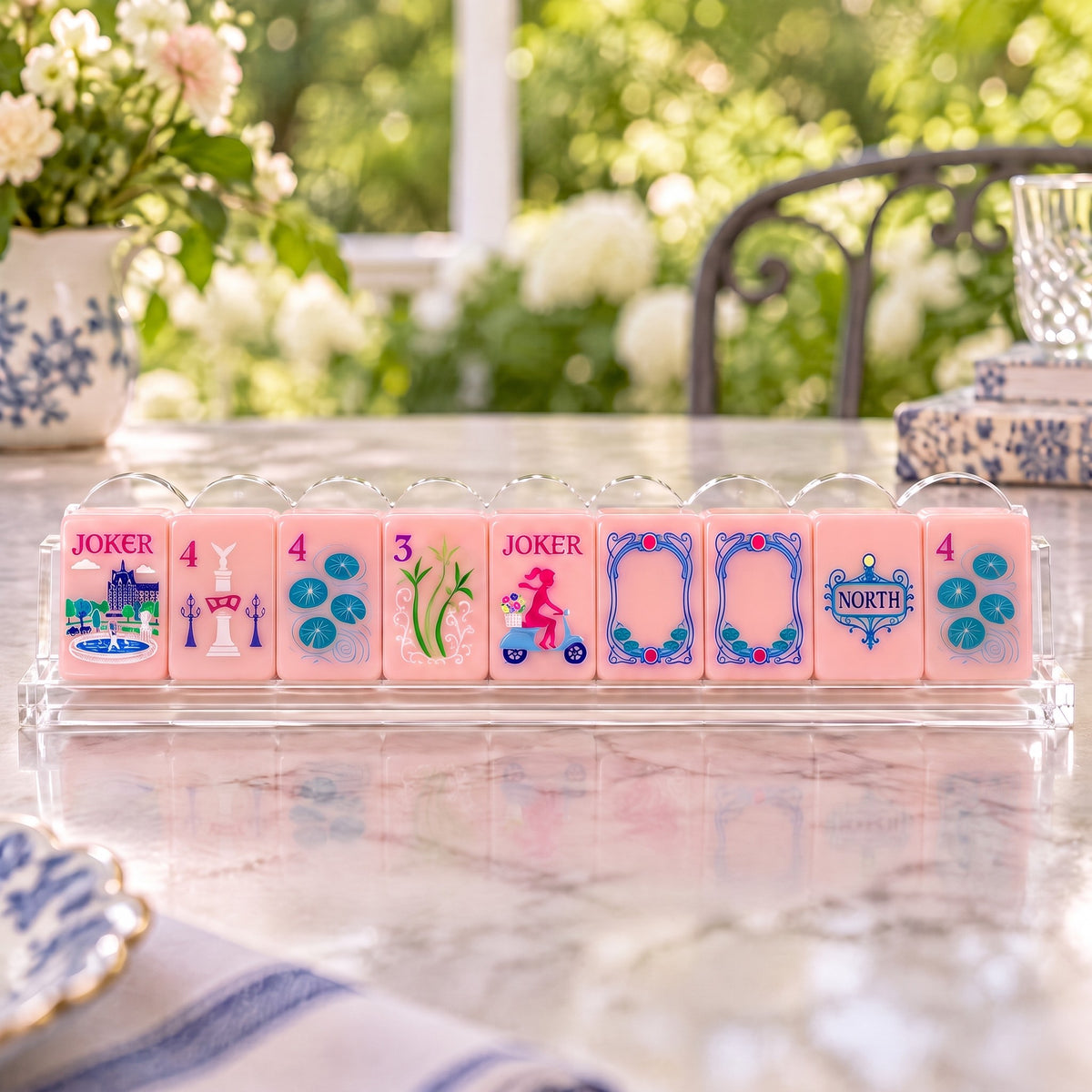 Pink Blossom American Mahjong Set, tiles on a rack, seen from across the table